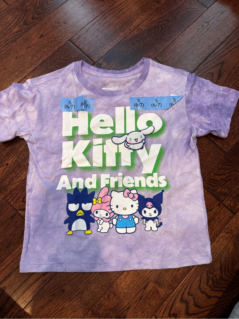 Hello Kitty Purple Tie-Dye Graphic Tee with Green and White Text